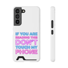 A white phone case with a black camera module, displaying the neon text "IF YOU ARE READING THIS DON'T TOUCH MY PHONE" in blue, pink, and purple, with a card slot at the bottom.