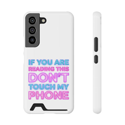 A white phone case with a black camera module, displaying the neon text "IF YOU ARE READING THIS DON'T TOUCH MY PHONE" in blue, pink, and purple, with a card slot at the bottom.